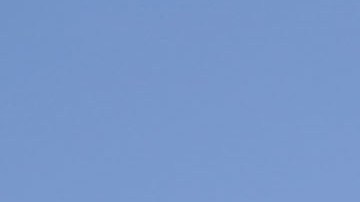 The letters “CJNG” for the group’s formal name, Jalisco New Generation Cartel, are scrawled on the facade of an abandoned home, in El Limoncito, in the Michoacan state of Mexico, Saturday, Oct. 30, 2021. The cartel based in Jalisco state is invading neighboring Michoacan, causing thousands of farmers to flee, with some seeking asylum in the United States. (AP Photo/Eduardo Verdugo)