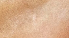 FILE - Dr. Sydney Sewall fills a syringe with the COVID-19 vaccine at the Augusta Armory, Dec. 21, 2021, in Augusta, Maine. (AP Photo/Robert F. Bukaty, File)