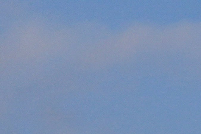 Properties damaged by the Palisades Fire are seen from a coastline perspective in the Pacific Palisades neighborhood of Los Angeles, Friday, Jan. 17, 2025. (AP Photo/Carolyn Kaster)