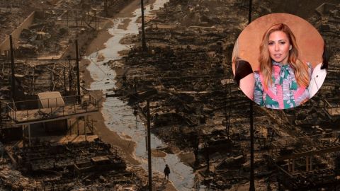 A person walks amid the destruction left behind by the Palisades Fire in the Pacific Palisades neighborhood of Los Angeles, Thursday, Jan. 9, 2025.