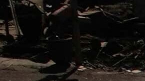 Firefighters walk along a road in a fire-ravaged community in the aftermath of the Palisades Fire in the Pacific Palisades neighborhood of Los Angeles, Monday, Jan. 13, 2025. (AP Photo/John Locher)