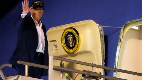 President Donald Trump boards Air Force One at Los Angeles International Airport in Los Angeles, Friday, Jan. 24, 2025, en route to Las Vegas. (AP Photo/Mark Schiefelbein)