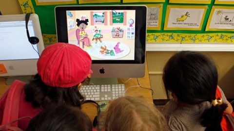 In this June 3, 2010 photo, first-graders get hands-on experience with a computer at Wonderland Avenue Elementary School in the Hollywood Hills area of Los Angeles. Wonderland Avenue Elementary School and Edwin Markham Middle School have been highlighted as the Los Angeles Unified School District has grappled with $1.5 billion in budget cuts and nearly 3,000 teacher layoffs during the past two years. But comparing the two schools shows a remarkably uneven impact, and just how much depends on factors ranging from income and parent involvement to teacher tenure. (AP Photo/Reed Saxon)