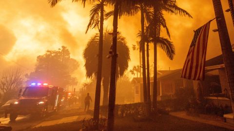 Fire crews battle the Eaton Fire Wednesday, Jan. 8, 2025 in Altadena, Calif. (AP Photo/Ethan Swope)