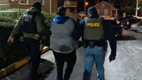 U.S. Immigration and Customs Enforcement officers detain a person, Monday, Jan. 27, 2025, in Silver Spring, Md. (AP Photo/Alex Brandon)