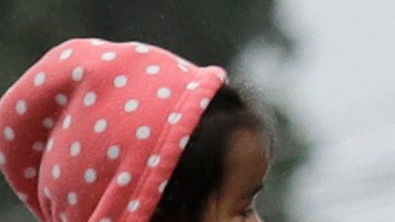 In this photo taken Wednesday, July 17, 2019, Jose Robles, center in white hat, walks with supporters before he presented himself to U.S. Immigration and Customs Enforcement officials in Tukwila, Wash. The prospect of nationwide immigration raids has provided evidence that legions of pastors, rabbis and their congregations stand ready to help vulnerable immigrants with offers of sanctuary and other services. (AP Photo/Elaine Thompson)