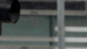 Commuters walk under a light rain downtown in Los Angeles on Wednesday, Feb. 17, 2016, as a storm system arriving in California ends days of clear skies, blazing sunshine and record-setting heat. The National Weather Service said the storm would arrive in Southern California by night, bringing gusty winds to the mountains and passes along with rain and snow through Thursday morning. (AP Photo/Nick Ut)