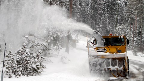 FILE - This Feb. 28, 2012 file photo shows a snow blower clearing a road after an overnight storm dropped several inches of snow near Echo Summit Calif. The weather forecast for this winter is mostly a shrug of the shoulders. For most of the nation, the National Oceanic Atmospheric Administration (NOAA) predicts equal chances for unusual warmth, cold, snow, rain and even average weather. Thats because certain global weather factors, like El Nino, arent big and apparent. (AP Photo/Rich Pedroncelli, File)