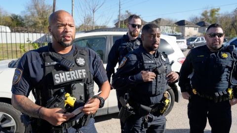 Harris County Sheriff's officers clear the media from the neighborhood where 42-year-old suspect Shamsud-Din Bahar Jabbar is believed to have lived, Wednesday, Jan. 1, 2025, in Houston, after a pickup truck rammed into a crowd of New Orleans revelers on Bourbon Street early on New Year's Day. (AP Photo/David J. Phillip)