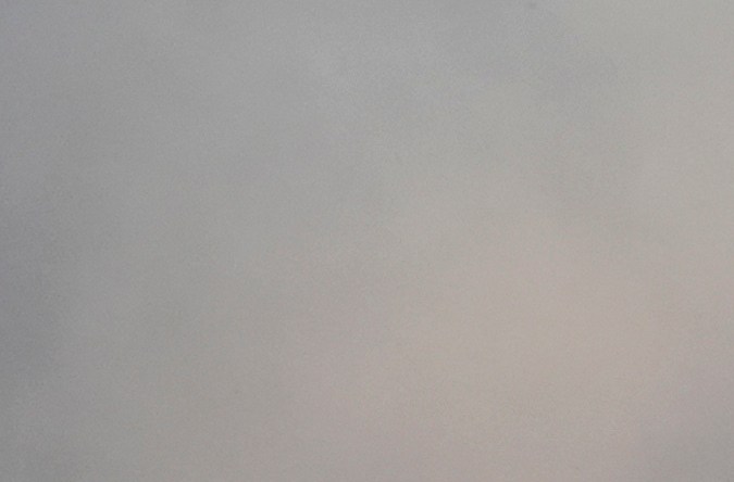 A burned-out car sits among rubble in the downtown Altadena section of Pasadena, Calif., Wednesday, Jan. 8, 2025. (AP Photo/Chris Pizzello)