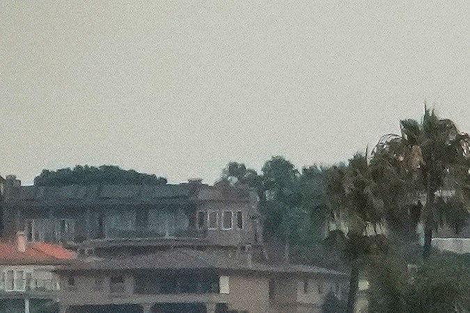 Surfers wait for waves at Doheny State Park Beach off Dana Point, Calif., Sunday, Aug. 20, 2023. Tropical Storm Hilary swirled northward Sunday just off the coast of Mexico's Baja California peninsula, no longer a hurricane but still carrying so much rain that forecasters said "catastrophic and life-threatening" flooding is likely across a broad region of the southwestern U.S. (AP Photo/Damian Dovarganes)