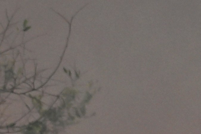 Residents embrace in front of burning structures as the Eaton Fire advances Wednesday, Jan. 8, 2025 in Altadena, Calif. (AP Photo/Nic Coury)