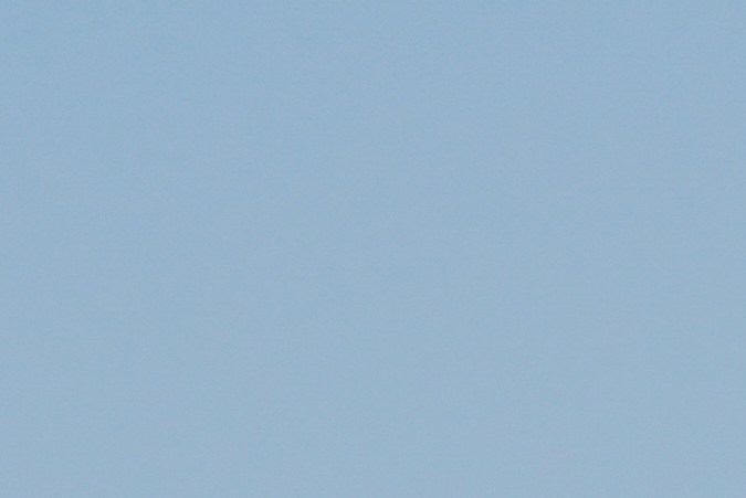 Properties are damaged by the Palisades Fire, in a view from the coastline, in the Pacific Palisades neighborhood of Los Angeles, Wednesday, Jan. 15, 2025. (AP Photo/Carolyn Kaster)