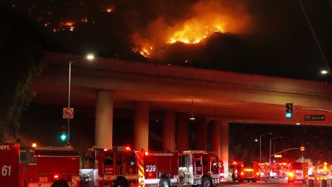 Apparatus sits on Sepulveda Blvd. as fire burns along Interstate 405, Thursday, Jan. 23, 2025, in Los Angeles. (AP Photo/Mark J. Terrill)