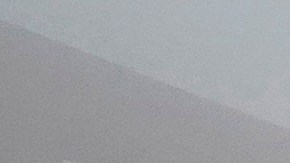 Un guardia aleja a periodistas del Instituto de Virología de Wuhan después de que un equipo de la OMS llegara para una visita el 3 de febrero de 2021.