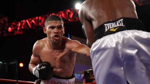 Juan Manuel Lopez, left, in action against Rogers Mtagwa during a WBO Super Bantamweight title fight at the WaMu theater on Saturday, October 10, 2009 in New York. Lopez won via 12 round decision. (AP Photo/Gregory Payan)