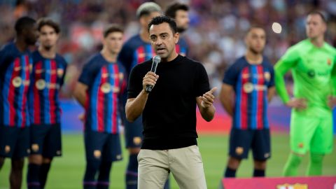 Barcelona's coach Xavi Hernandez addresses to the crowd prior of the Joan Gamper trophy soccer match between FC Barcelona and Pumas Unam at the Camp Nou Stadium in Barcelona, Spain, Sunday, Aug. 7, 2022. (AP Photo/Joan Monfort)