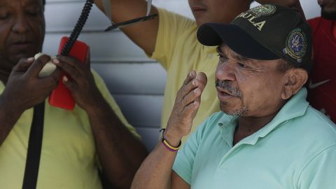 Luis Manuel Díaz talks to neighbors outside his home in Barrancas, Colombia, after he was released by kidnappers Thursday, Nov. 9, 2023. Díaz, the father of Liverpool striker Luis Díaz, was kidnapped on Oct. 28 by the guerrilla group National Liberation Army, or ELN. (AP Photo/Ivan Valencia)
