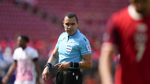 Referee Marco Ortiz looks on during the first half of a CONCACAF Nations League Play-In soccer match between Trinidad And Tobago and Canada, Saturday, March 23, 2024, in Frisco, Texas. (AP Photo/Julio Cortez)