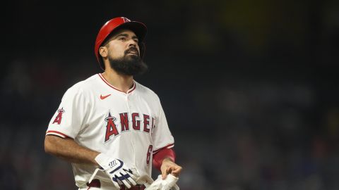 Los Angeles Angels' Anthony Rendon reacts after drawing a walk during the ninth inning of a baseball game against the Toronto Blue Jays, Tuesday, Aug. 13, 2024, in Anaheim, Calif. (AP Photo/Ryan Sun)