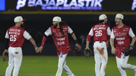 Players of Mexico celebrate after a Caribbean Series baseball game against Dominican Republic at Nido de los Aguilas stadium in Mexicali, Mexico, Sunday, Feb. 2, 2025. (AP Photo/Fernando Llano)