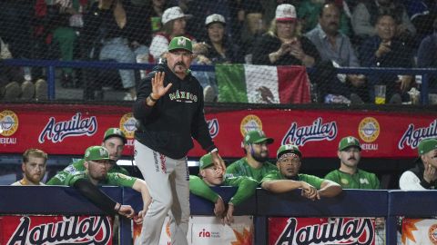 Mexico's manager Benjamin Gil gestures during a Caribbean Series baseball game against Japan at Nido de los Aguilas stadium in Mexicali, Mexico, Monday, Feb. 3, 2025. (AP Photo/Fernando Llano)