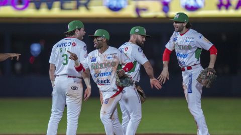 Players of Mexico celebrate after a Caribbean Series baseball semifinal game against Puerto Rico at Nido de los Aguilas stadium in Mexicali, Mexico, Wednesday, Feb. 5, 2025. (AP Photo/Fernando Llano)