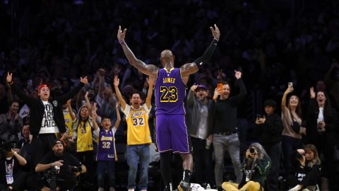 Los Angeles Lakers forward LeBron James celebrates with fans after defeating the Golden State Warriors, during an NBA basketball game Thursday, Feb. 6, 2025, in Los Angeles. (AP Photo/Kevork Djansezian)