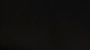 Flores y un cartel en el exterior de la sede de la USAID, que fue cerrada el 7 de febrero de 2025, en Washington D.C.