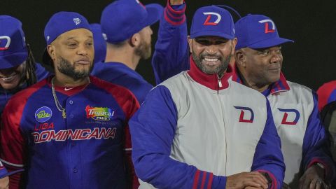 Dominican Republic's manager Albert Pujols, right, celebrates after winning the Caribbean Series baseball final game at Nido de los Aguilas stadium in Mexicali, Mexico, Friday, Feb. 7, 2025. (AP Photo/Fernando Llano)