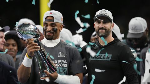 Philadelphia Eagles quarterback Jalen Hurts, left, holds the Vince Lombardi Trophy next to head coach Nick Sirianni after defeating the Kansas City Chiefs in the NFL Super Bowl 59 football game, Sunday, Feb. 9, 2025, in New Orleans. (AP Photo/George Walker IV)