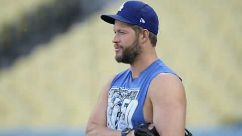 FILE - Los Angeles Dodgers pitcher Clayton Kershaw stands on the field during practice in preparation for Game 1 of a baseball NL Division Series against the San Diego Padres in Los Angeles, Friday, Oct. 4, 2024. (AP Photo/Ashley Landis, File)