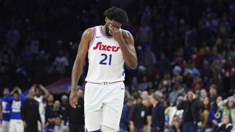 Philadelphia 76ers' Joel Embiid reacts after missing a shot during the second half of an NBA basketball game against the Toronto Raptors, Tuesday, Feb. 11, 2025, in Philadelphia. (AP Photo/Matt Slocum)