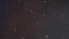 AC Milan's Santiago Gimenez kicks the ball during a warm up ahead of the Champions League playoff first leg soccer match between Feyenoord and AC Milan, at the De Kuip stadium, in Rotterdam, Netherlands, Wednesday, Feb. 12, 2025. (AP Photo/Peter Dejong)