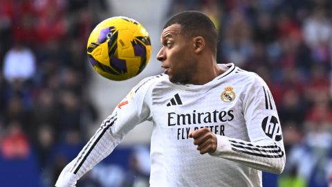 Real Madrid's Kylian Mbappe controls the ball during a Spanish La Liga soccer match between Osasuna and Real Madrid at El Sardar stadium in Pamplona, Spain, Saturday, Feb. 15, 2025. (AP Photo/Miguel Oses)