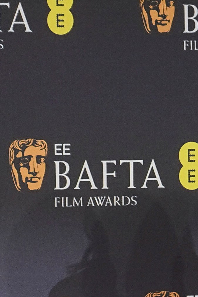 Pamela Anderson poses for photographers upon arrival at the 78th British Academy Film Awards, BAFTA's, in London, Sunday, Feb. 16, 2025. (Photo by Alberto Pezzali/Invision/AP)