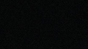 FILE - Emma Raducanu of Britain reacts during her third round match against Iga Swiatek of Poland at the Australian Open tennis championship in Melbourne, Australia, Saturday, Jan. 18, 2025. (AP Photo/Asanka Brendon Ratnayake, File)