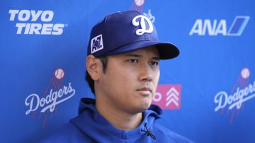 Los Angeles Dodgers two-way player Shohei Ohtani speaks to reporters during spring training baseball practice, Thursday, Feb. 20, 2025, in Phoenix. (AP Photo/Ashley Landis)Los Angeles Dodgers two-way player Shohei Ohtani speaks to reporters during spring training baseball practice, Thursday, Feb. 20, 2025, in Phoenix. (AP Photo/Ashley Landis)