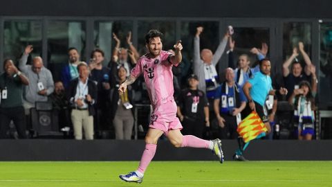 Inter Miami forward Lionel Messi (10) celebrates scoring his side's first goal against Sporting Kansas City during the first half of a CONCACAF Champions Cup soccer match, Tuesday, Feb. 25, 2025, in Fort Lauderdale, Fla. (AP Photo/Rebecca Blackwell)