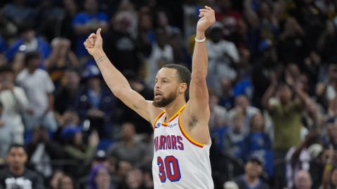 Golden State Warriors guard Stephen Curry (30) celebrates after making a 3-point shot against the Orlando Magic during the second half of an NBA basketball game, Thursday, Feb. 27, 2025, in Orlando, Fla. (AP Photo/John Raoux)