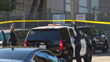 Los Angeles police cordon off the Belmont High School in Los Angeles Thursday, Feb. 1, 2018. Two students were shot inside a Los Angeles middle school classroom Thursday morning and police arrested a female student suspect, authorities said. (AP Photo/Damian Dovarganes)