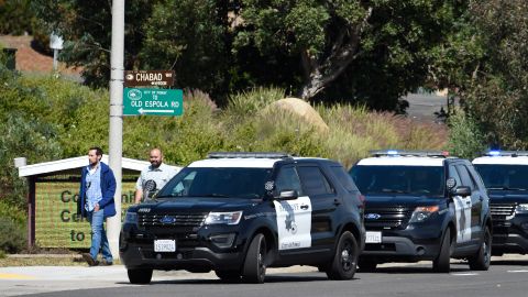 San Diego County Sheriff's vehicles line up outside of the Chabad of Poway Synagogue Saturday, April 27, 2019, in Poway, Calif. Several people were injured in a shooting at the synagogue. (AP Photo/Denis Poroy)