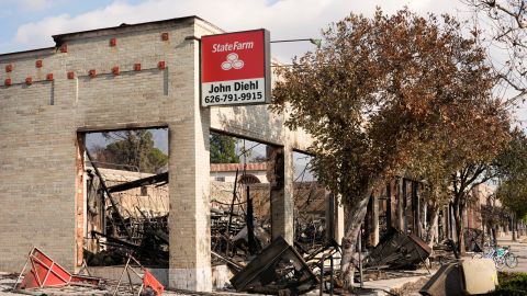 A State Farm insurance office lies in ruins after it was destroyed by the Eaton Fire on Mariposa Avenue in Altadena, Calif., Friday, Jan. 17, 2025. (AP Photo/Chris Pizzello)