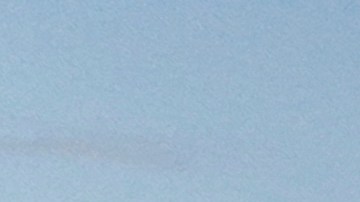 Motorists form a queue in a parking lot and along Pacific Coast Highway waiting to enter the Palisades Fire zone Tuesday, Jan. 28, 2025 in Santa Monica, Calif. (AP Photo/Jae C. Hong)