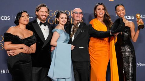 Adriana Paz, from left, Edgar Ramirez, Selena Gomez, Jacques Audiard, Karla Sofia Gascon, and Zoe Saldana pose in the press room with the award for best motion picture - musical or comedy for "Emilia Perez" during the 82nd Golden Globes on Sunday, Jan. 5, 2025, at the Beverly Hilton in Beverly Hills, Calif. (AP Photo/Chris Pizzello)