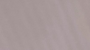 14-year-old Henry, right, and Angel, 15, use their phones to view social media in Sydney, Friday, Nov. 8, 2024. (AP Photo/Rick Rycroft)