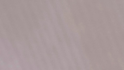 14-year-old Henry, right, and Angel, 15, use their phones to view social media in Sydney, Friday, Nov. 8, 2024. (AP Photo/Rick Rycroft)