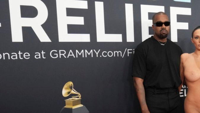Kanye West, left, and Bianca Censori arrive at the 67th annual Grammy Awards on Sunday, Feb. 2, 2025, in Los Angeles.