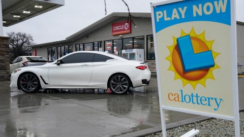 A car pulls into the Circle K store, Saturday, Dec. 28, 2024, where a Mega Millions lotto ticket worth an estimated $1.22 billion was puchased. After three months without anyone winning the top prize in the lottery, the ticket with the winning numbers was drawn Friday night. (AP Photo/Rich Pedroncelli)