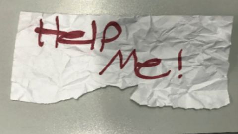 In this undated photo released by the U.S Department of Justice is a "Help Me!" sign used by a 13-year-old girl kidnapped in Texas. The girl was rescued in Southern California on July 9, 2023, when passersby saw her hold up the sign in a parked car, police said. The rescue occurred in Long Beach when officers responded to a trouble call and found the "visibly emotional and distressed girl," police said in a press release Thursday, July 20. (U.S. Department of Justice via AP)